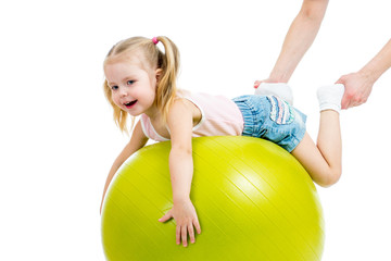 mother doing gymnastics with kid on fitness ball © Oksana Kuzmina