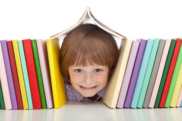 Happy boy with colorful books