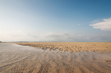 Fototapeta na wymiar Ocean and beach with yellow sand - beautiful landscape