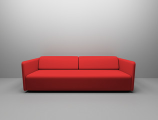 Red sofa up against blank wall