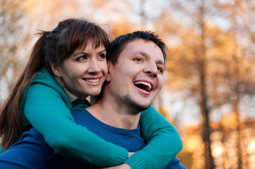 Fototapeta premium Young flying couple in the Park