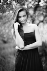 Young sensual model girl outdoor. Black and white photo