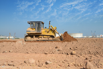 bulldozer on a building site © xiaoliangge