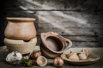 Still life pottery and wooden background
