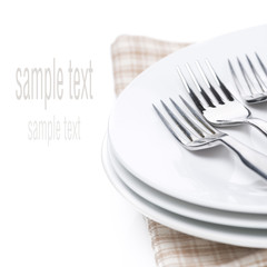 plates and forks - utensils for serving, isolated