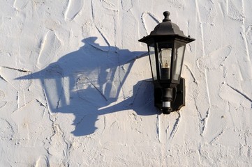Lantern with shadow on white wall, Spain © Arena Photo UK © arenaphotouk