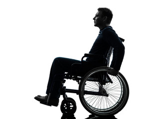 side view serious handicapped man in wheelchair silhouette