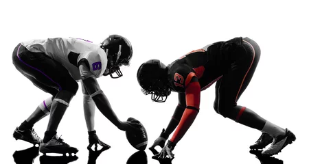 Tuinposter two american football players on scrimmage silhouette © snaptitude