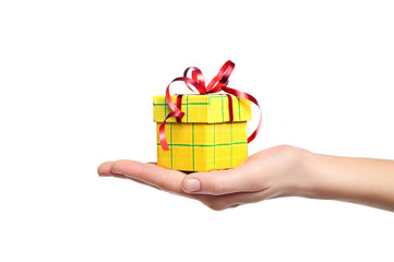 hand holding gift box isolated