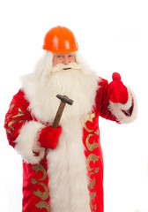 Santa Claus in the construction helmet and a hammer.