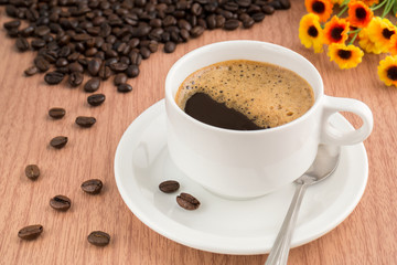 Obraz na płótnie Canvas Coffee cup and beans