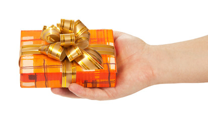 Man's hand holding the gift box