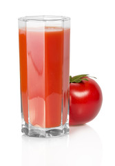 Fototapeta na wymiar Glass of juice and the tomato