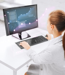 businesswoman with computer in office