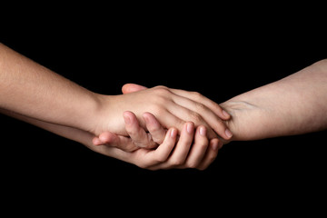 granddaughter and grandmother holding hands