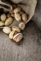 roasted and salted pistachios pour out of the bag
