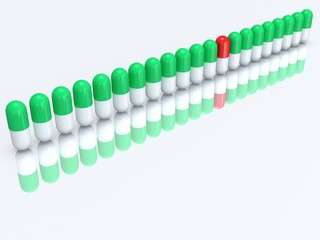 Half red capsule in row of half green pills. 3D