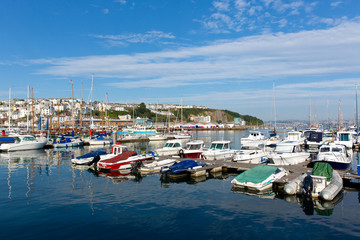 Fototapeta na wymiar boats and yachts in marina on calm blue sea