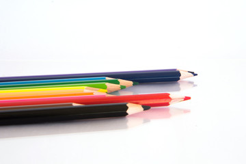 Colour pencils isolated on white background close up