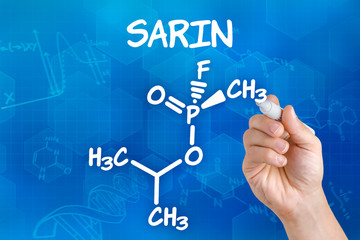 Hand zeichnet chemische Strukturformel von Sarin