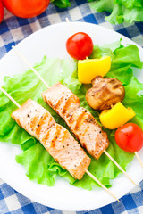 Grilled salmon and vegetable skewers