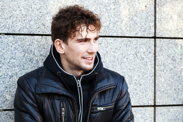 Obraz premium Handsome young man in casual autumn clothes