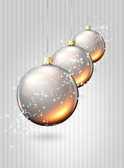 christmas glass balls over silver background