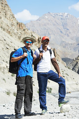 smiling tourist hiker in india mountains