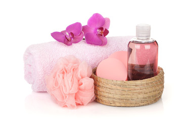 Cosmetics, towel and orchid flowers