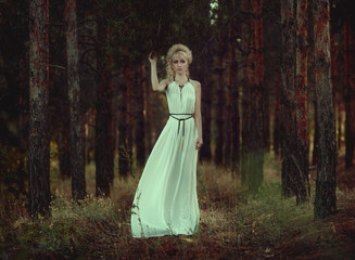 Portrait of romantic woman in forest