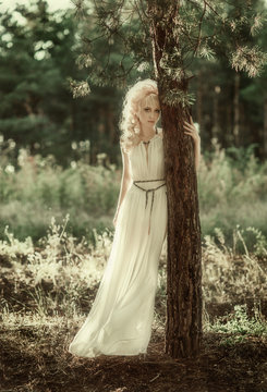 Portrait of romantic woman in forest