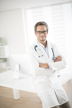 young doctor at his office