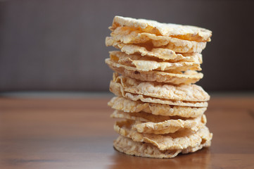 Rice cakes stacked on wooden background