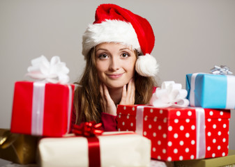 Cute girl with christmas presents