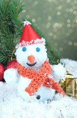 Beautiful snowman and Christmas decor, on bright background
