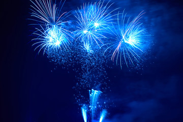 Fototapeta na wymiar Blue colorful fireworks