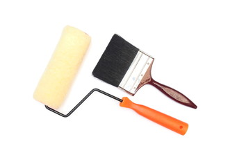 Paint roller and brush isolated on white background