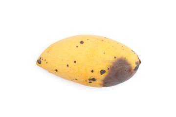 Overripe yellow mango on white background