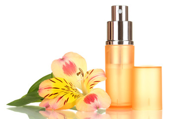 Women's perfume in beautiful bottle with flower isolated