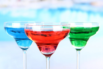 Different cocktails on bright background