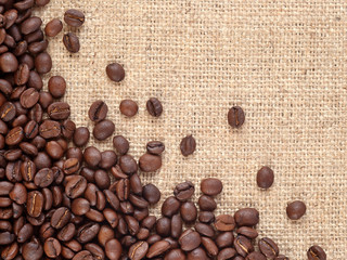 Coffee beans in a sacking background