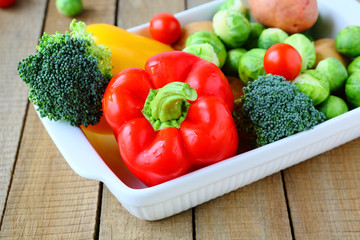 fresh vegetables and cooking utensils