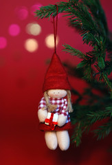 Christmas tree branch with Christmas toy