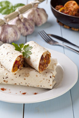 burritos wraps with meat beans and vegetables