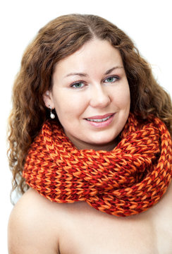 Happy young woman with naked torso in neck scarf