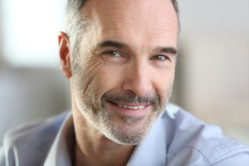 Closeup of handsome senior man with grey hair