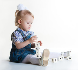 Little girl playing with blocks
