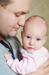 newborn baby with father