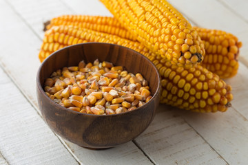 Fresh corn on wooden background