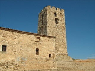 Fototapeta na wymiar Ancient Greek Tower and Church